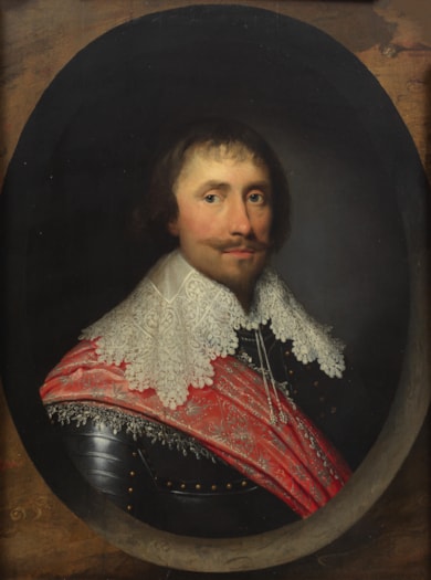 Portrait of Robert de Vere, 19th Earl of Oxford, bust-length, in armour with a lace collar and red sash, within a painted oval